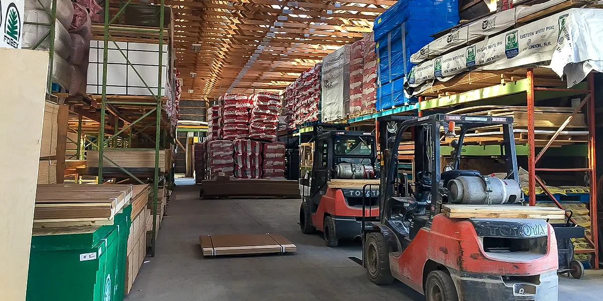material warehouse with forklift and building materials